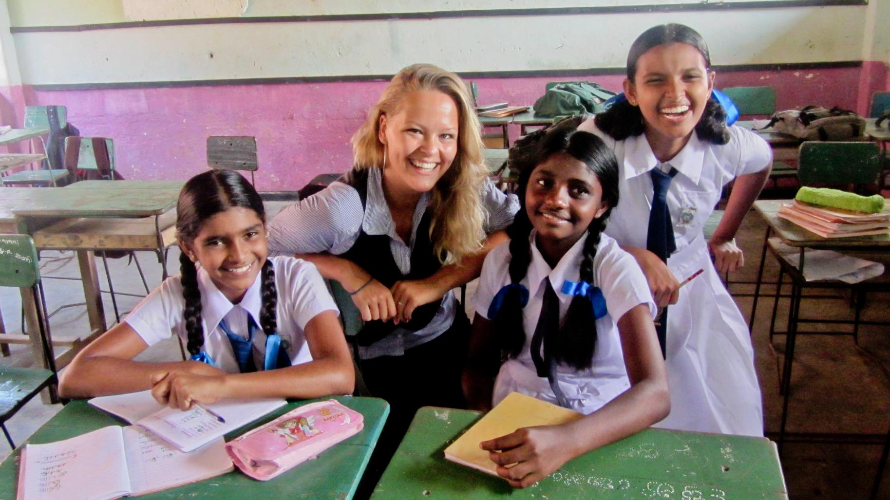 A group photo of a Projects Abroad volunteer teaching in Sri Lanka with her students Students and a volunteer at her volunteer teaching placement in Sri Lanka